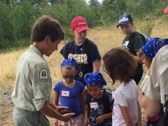 Volunteers of Grand Family Coalition and five children