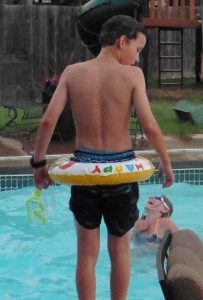 A Child Ready to Swim in swimming pool